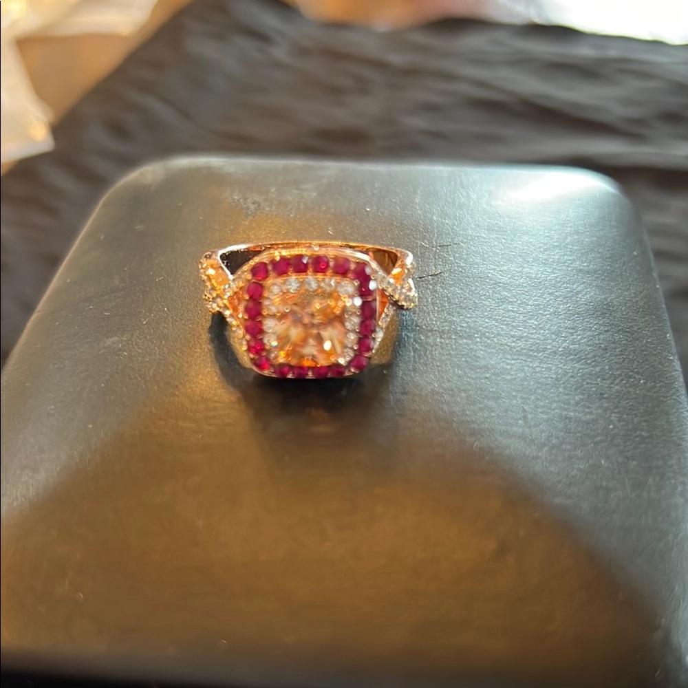 Elegant Gold and Red Gemstone Ring